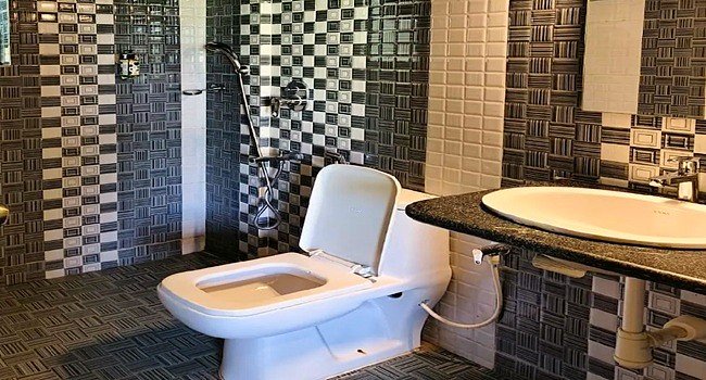 goa blossam resort, bathroom